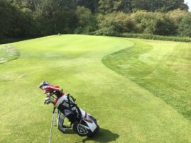Steve King's Golf Bag next to the Chipping Green At Manor House Golf Club in wiltshire